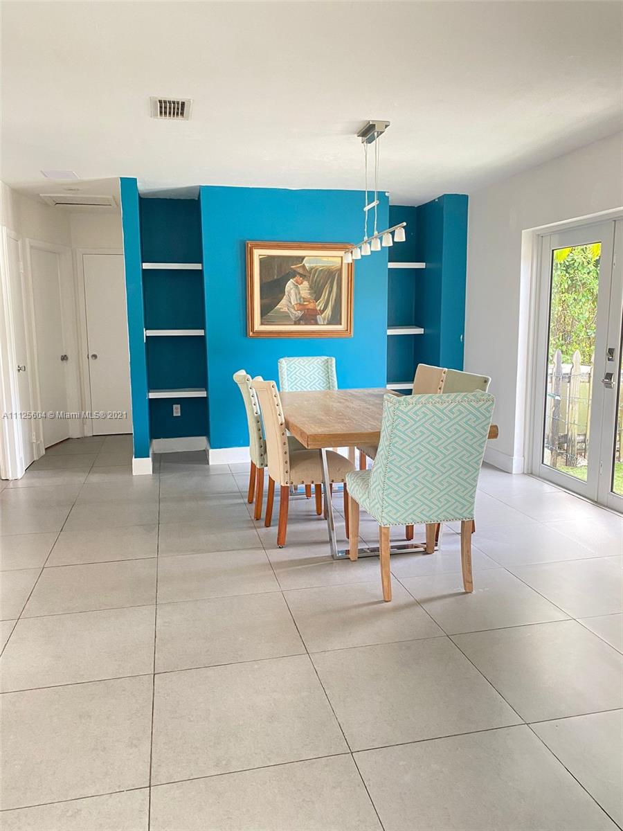 Kendale Lakes Miami, FL 33183 - Photo 17 of 17 a view of a dining room with furniture and window