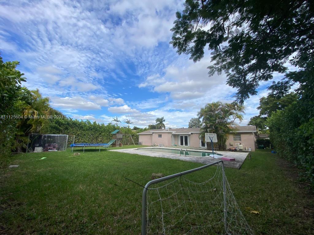 Kendale Lakes Miami, FL 33183 - Photo 7 of 17 a view of a house with a big yard