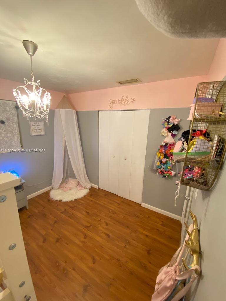 Kendale Lakes Miami, FL 33183 - Photo 9 of 17 a view of a room with gym equipment