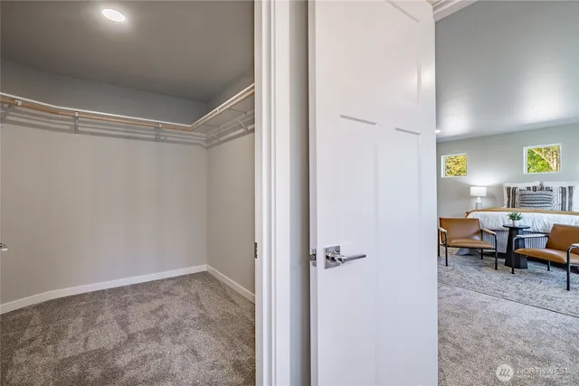 a bathroom with a shower and a sink