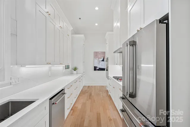 a bed room with a bed and a large window