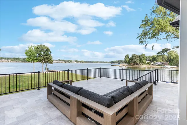 a view of a hallway with windows