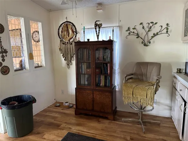 a workspace with furniture and a window