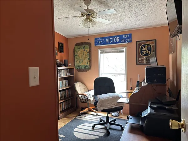 a room with furniture and wooden floor
