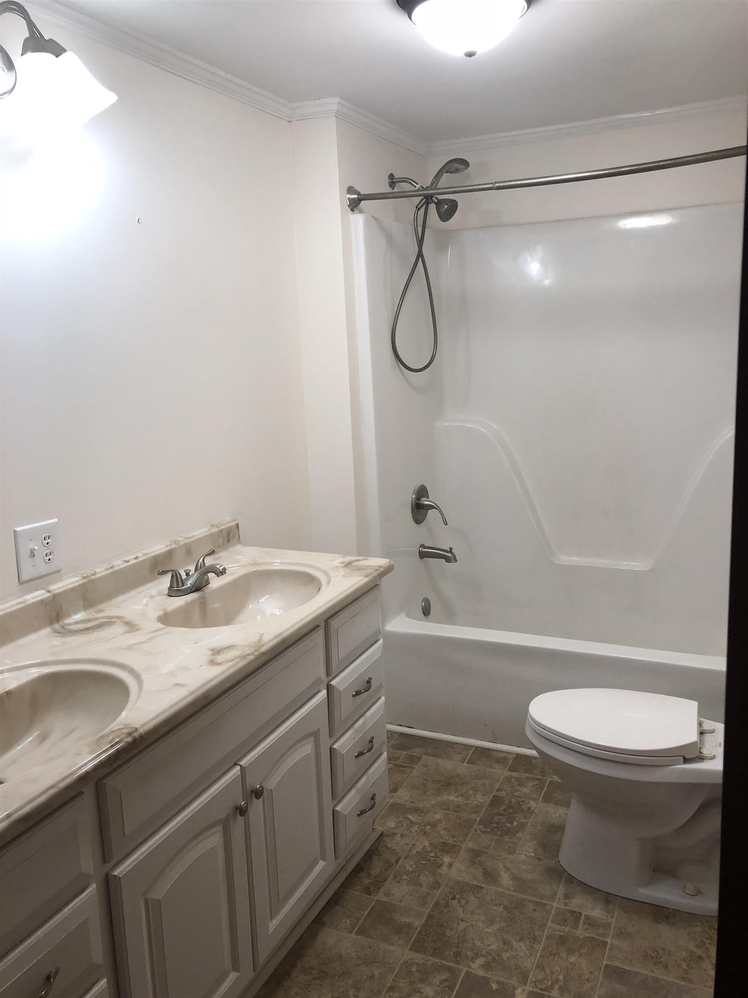 3107 Pea Ridge Road Liberty, TN 37095 - Photo 13 of 13 a bathroom with a granite countertop sink toilet and shower