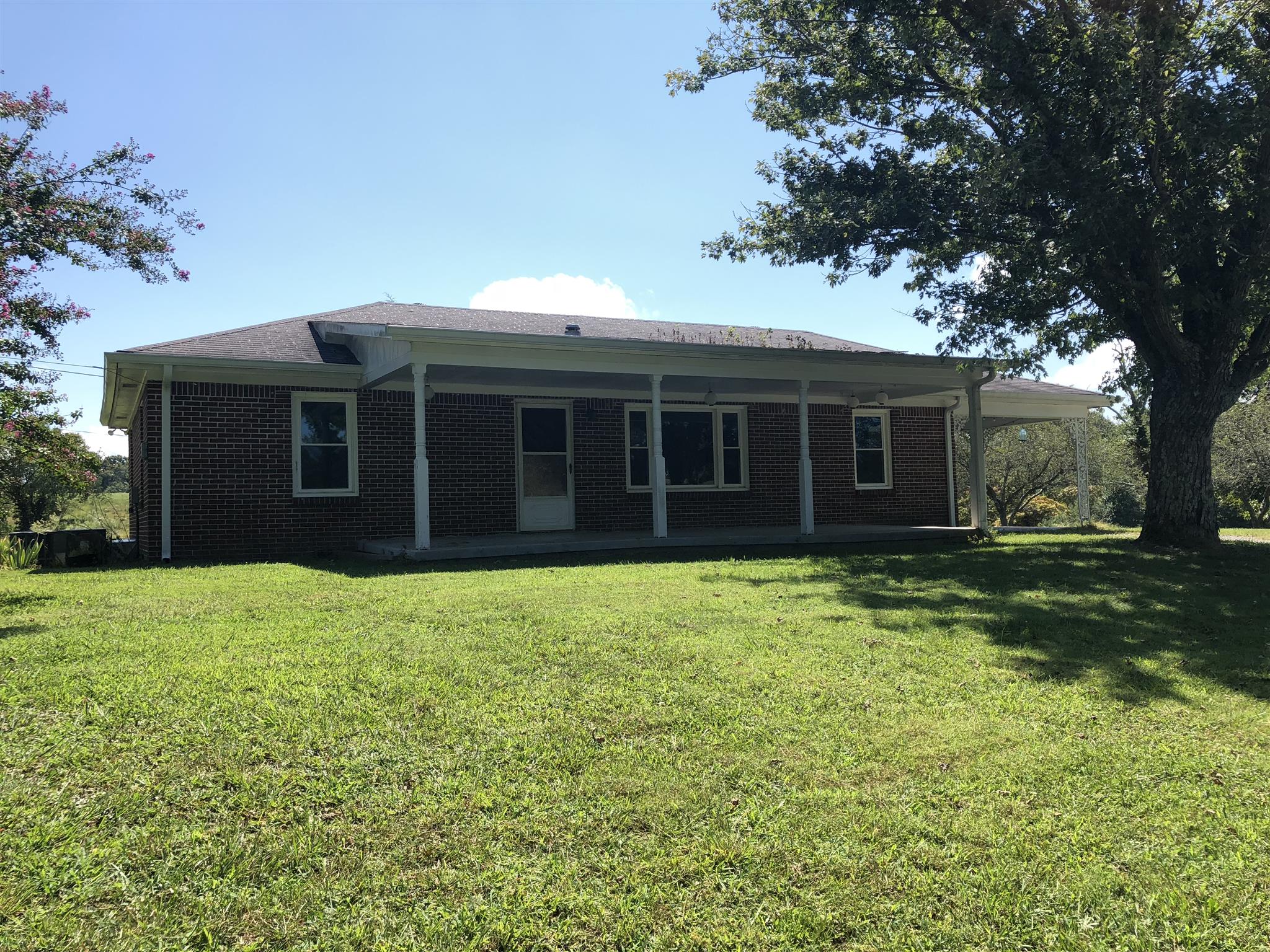 3107 Pea Ridge Road Liberty, TN 37095 - Photo 2 of 13 front view of a house with a yard