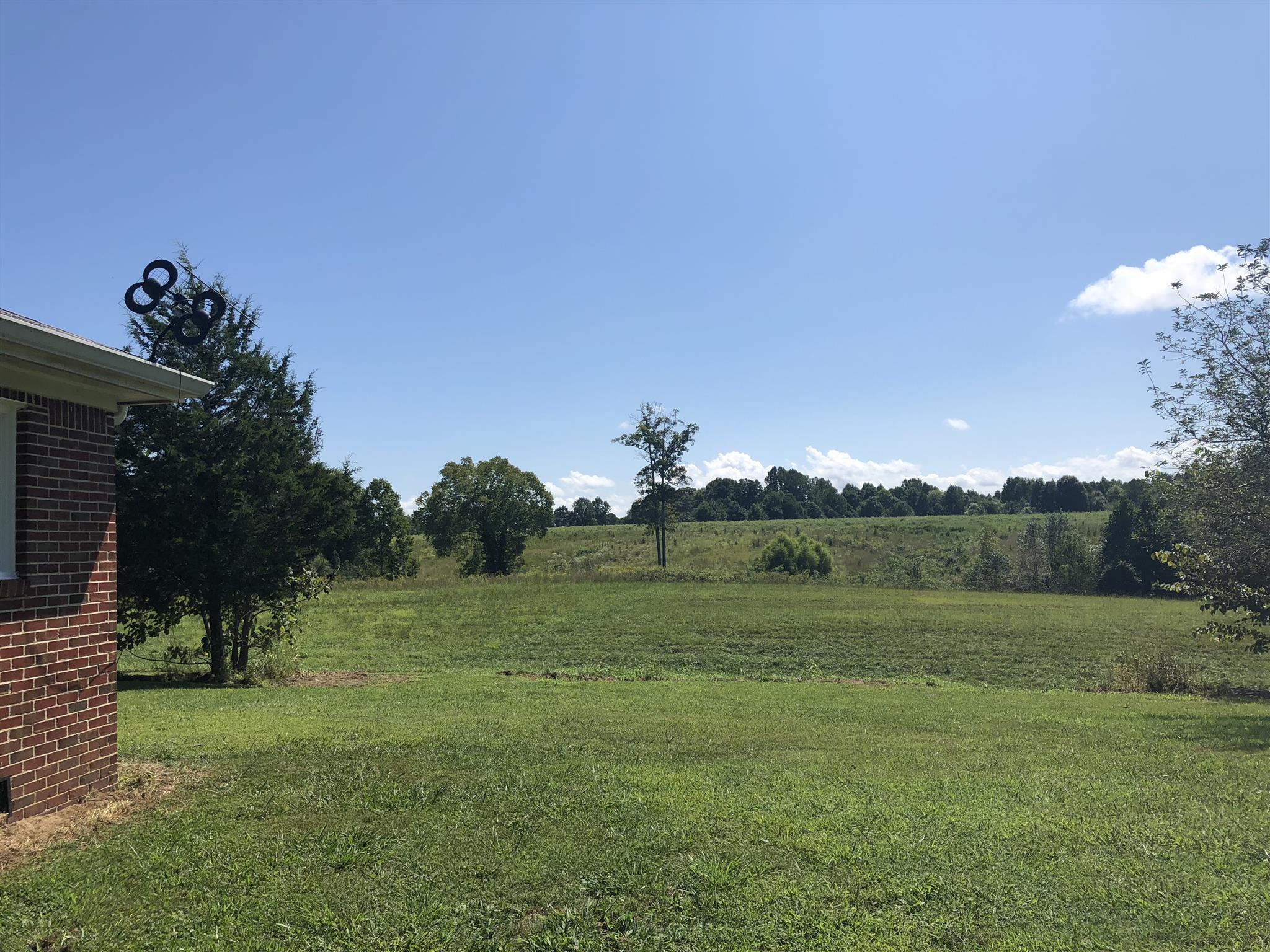 3107 Pea Ridge Road Liberty, TN 37095 - Photo 3 of 13 a view of a field of grass and trees