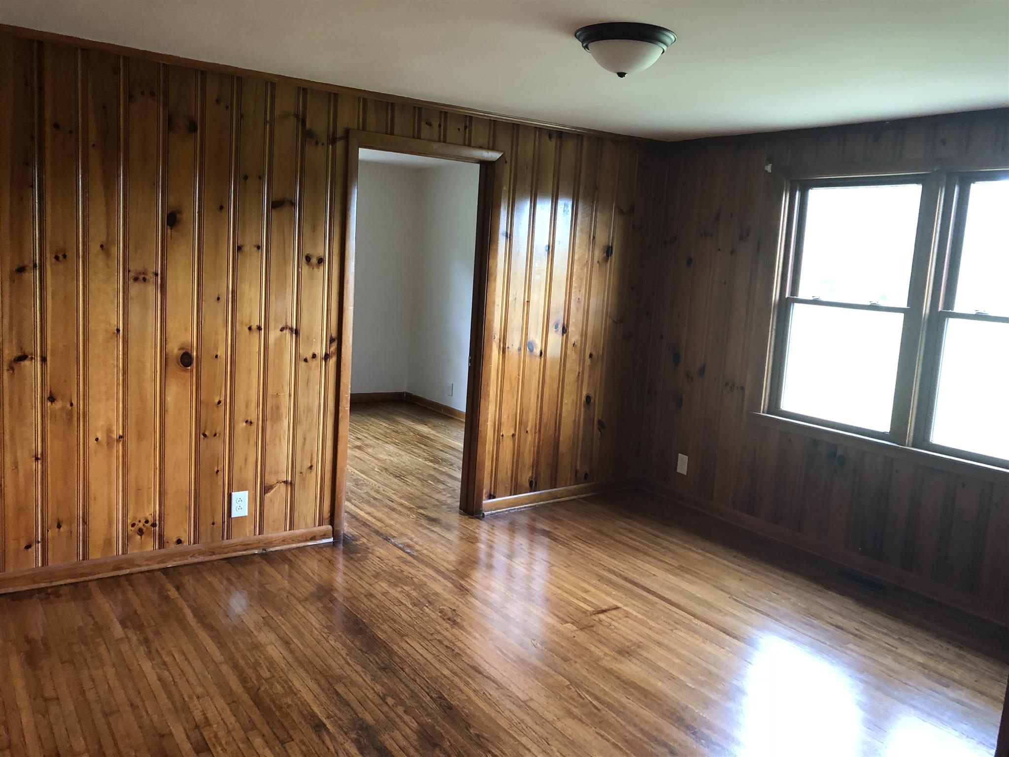 3107 Pea Ridge Road Liberty, TN 37095 - Photo 7 of 13 an empty room with wooden floor and windows