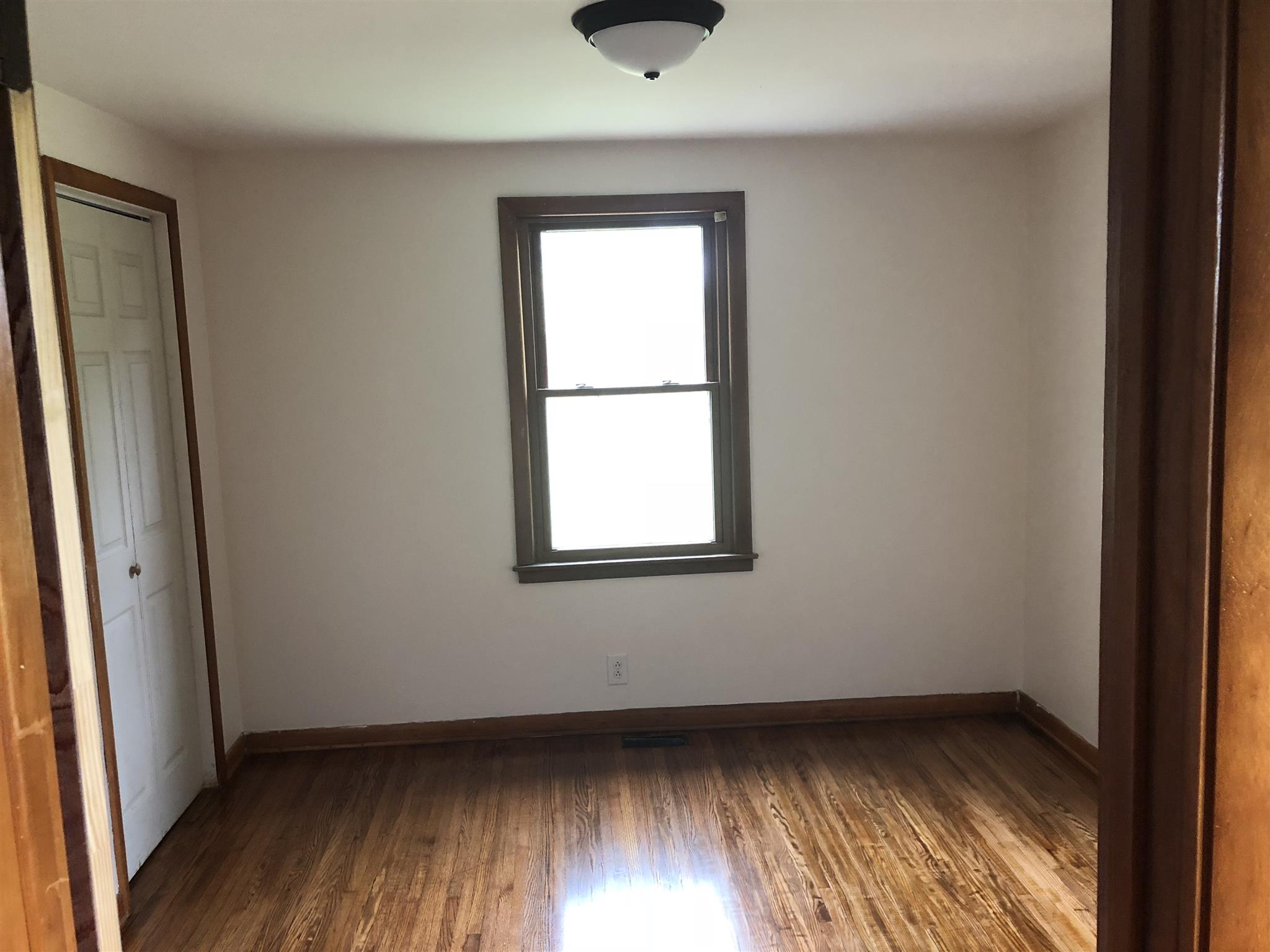 3107 Pea Ridge Road Liberty, TN 37095 - Photo 8 of 13 an empty room with wooden floor and windows
