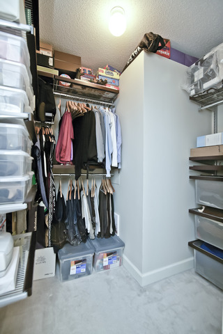 2 East Erie Street, Unit 1611 Chicago, IL 60611 - Photo 8 of 12 a view of walk in closet with clothes and shoes