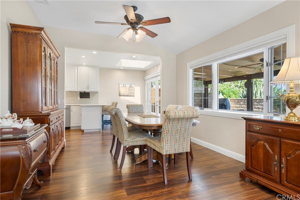 5965 Maybrook Circle Riverside, CA 92506 - Photo 11 of 34 a view of a dining room with furniture window and wooden floor