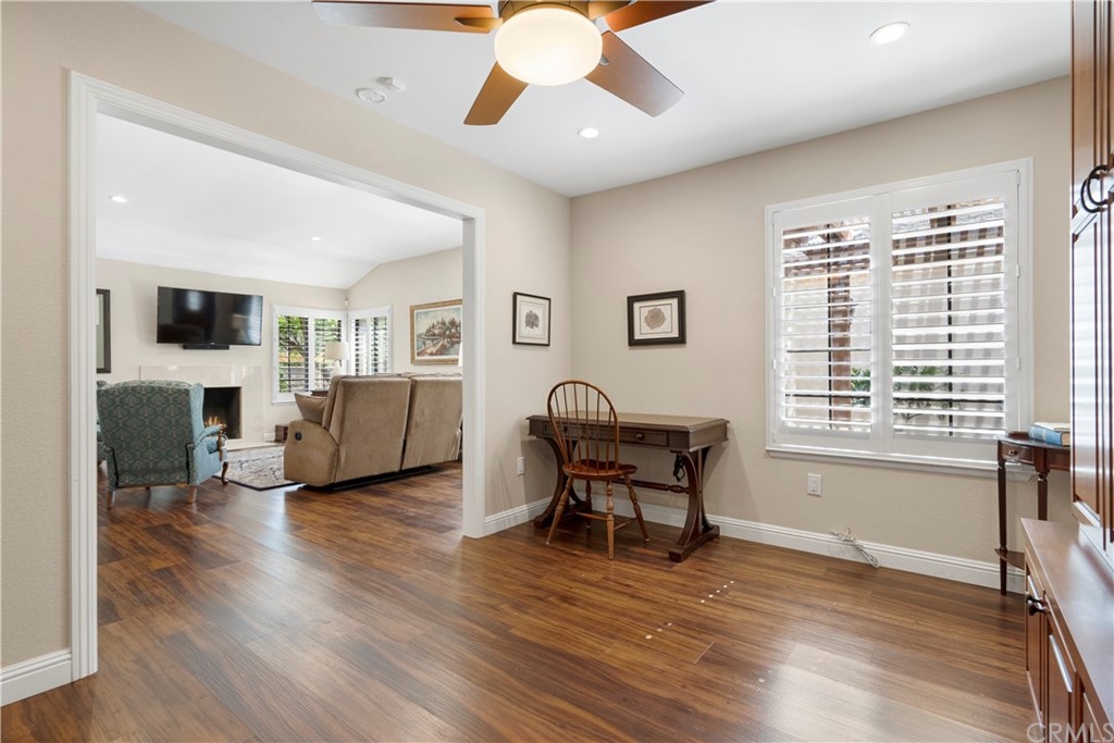 5965 Maybrook Circle Riverside, CA 92506 - Photo 20 of 34 a living room with furniture and a wooden floor