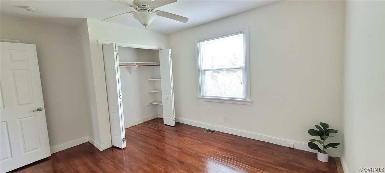 10617 Reams Road Chesterfield, VA 23236 - Photo 27 of 34 an empty room that has a window and wooden floor