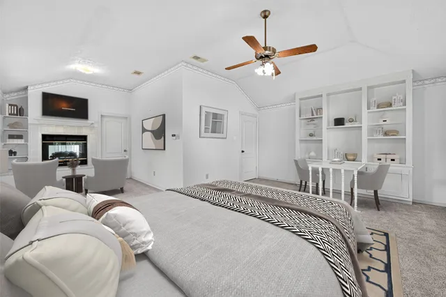 a bedroom with a bed furniture and a window