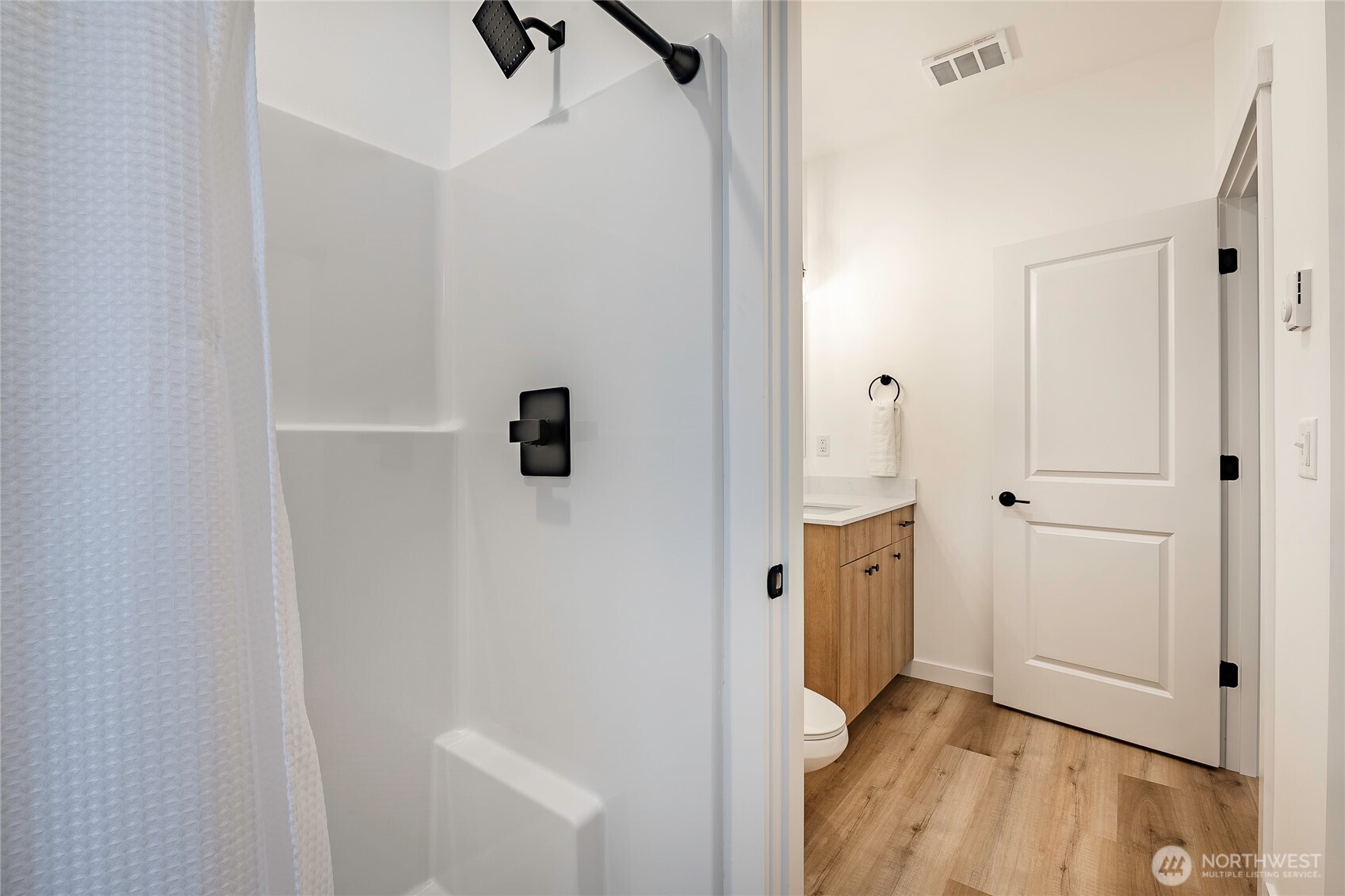 2999 Cedar View Road Blaine, WA 98230 - Photo 32 of 37 a view of a hallway with wooden floor