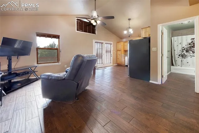 a living room with furniture and a window