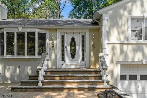 a front view of a house with a porch