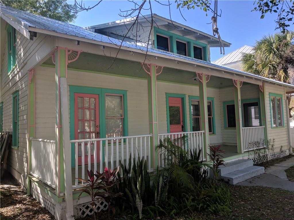 412 Southwest California Avenue Stuart, FL 34994 - Photo 4 of 46 a house view with a garden space