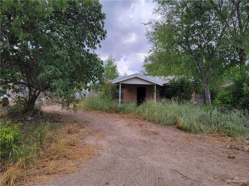159 Guadalupe Flores Road Sullivan City, TX 78595 - Photo 4 of 5 a view of a house with a yard