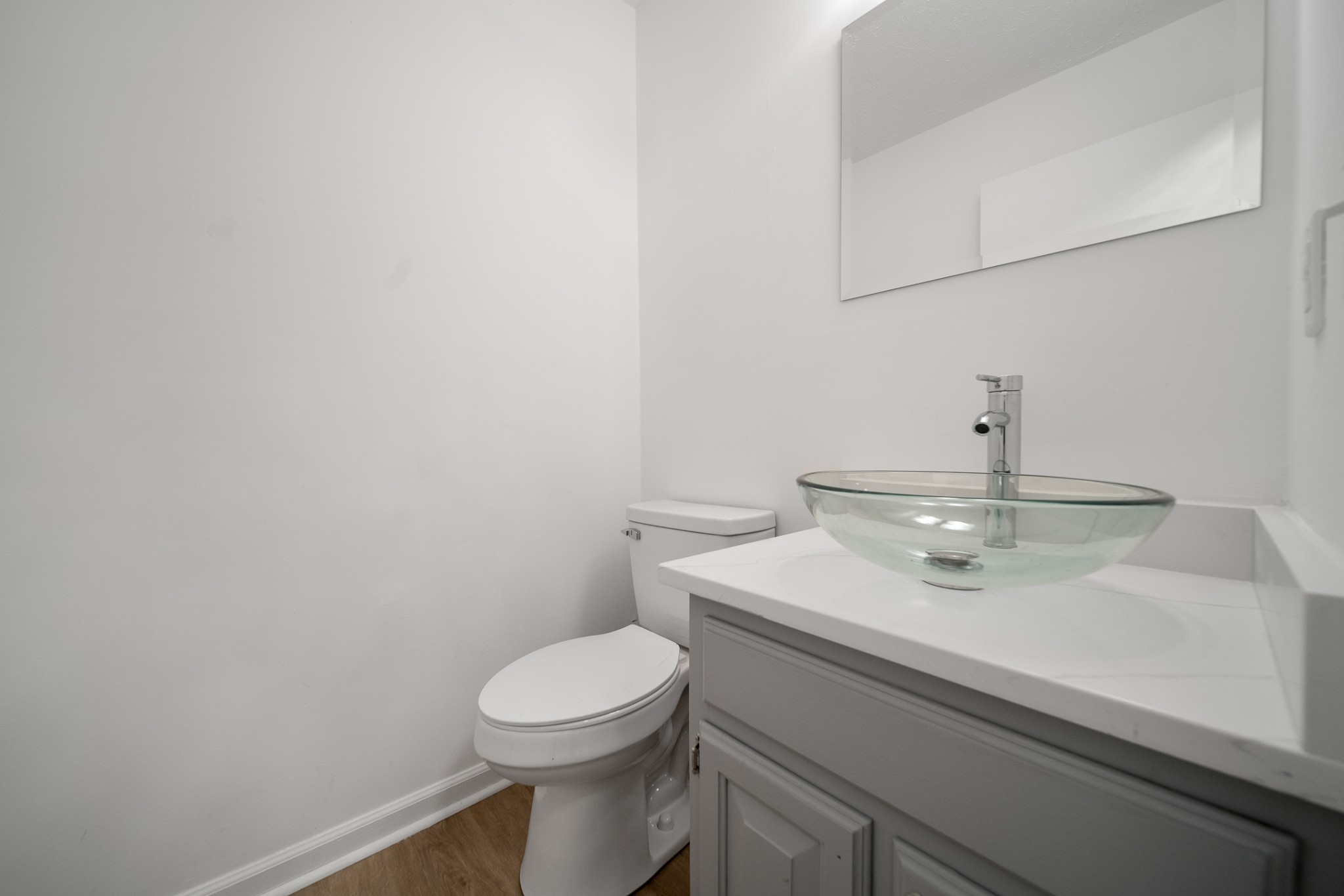 2417 Ravine Drive Nashville, TN 37217 - Photo 13 of 29 a bathroom with a sink a toilet and mirror