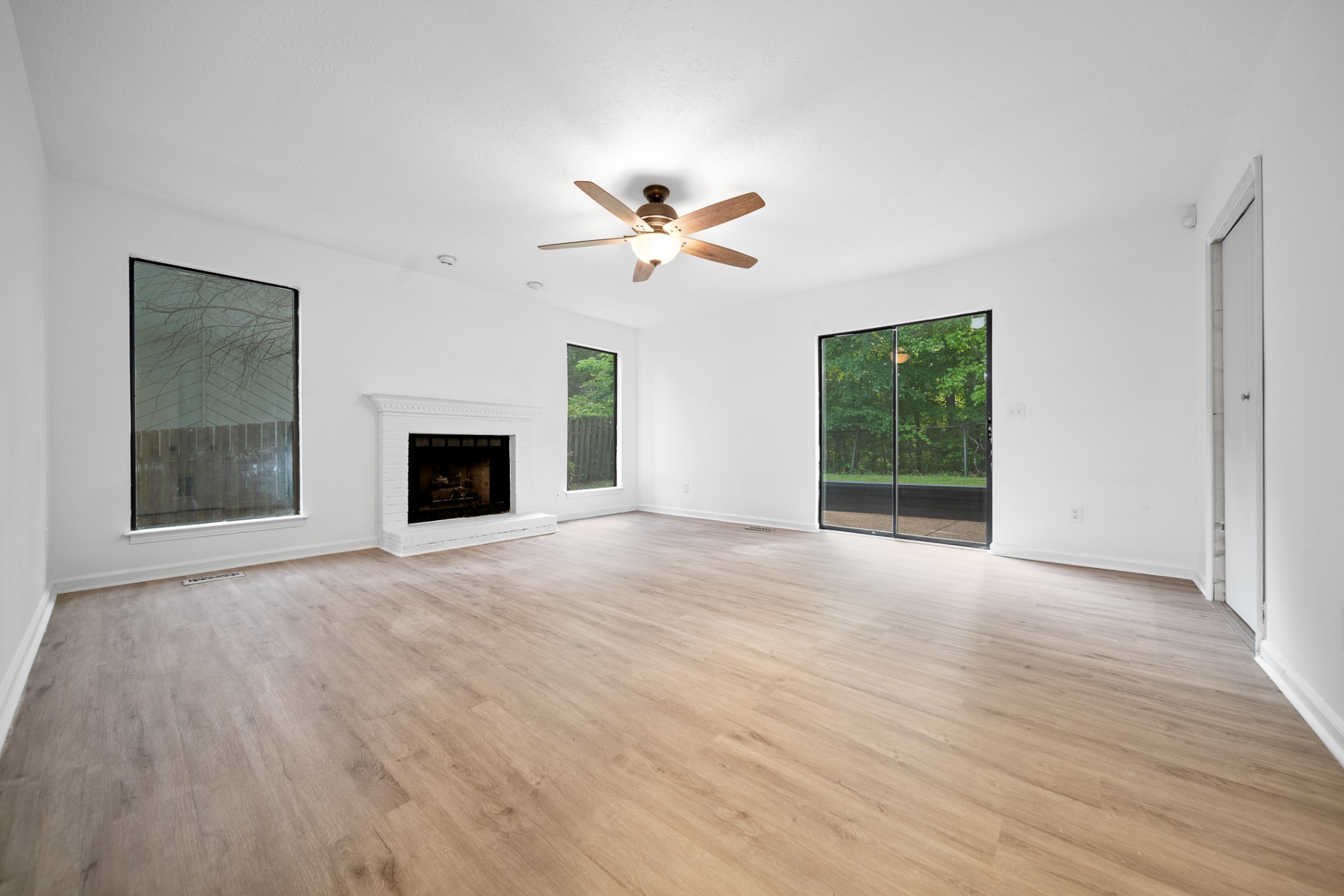 2417 Ravine Drive Nashville, TN 37217 - Photo 14 of 29 a view of an empty room with a window and a kitchen