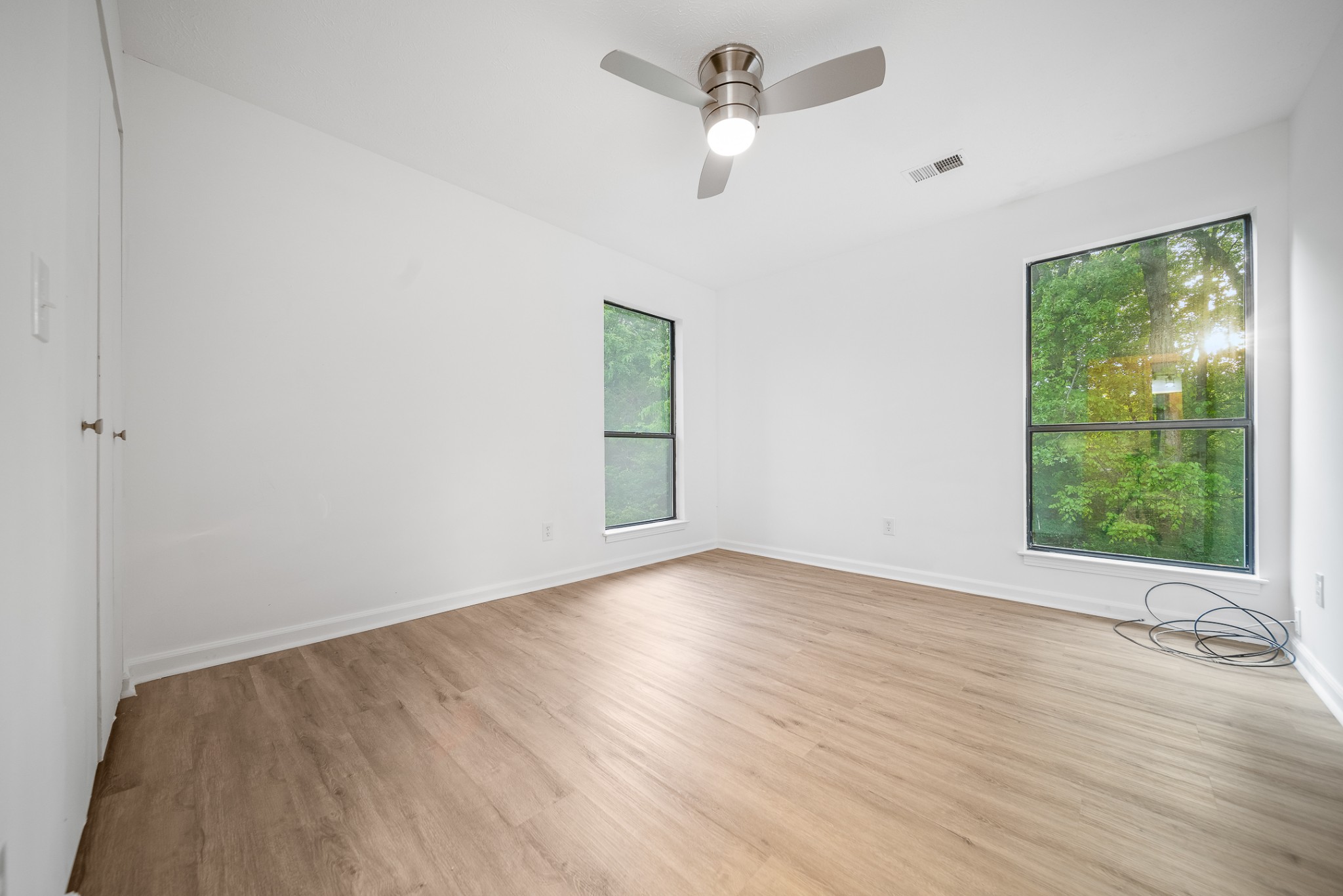 2417 Ravine Drive Nashville, TN 37217 - Photo 16 of 29 wooden floor in an empty room with a window