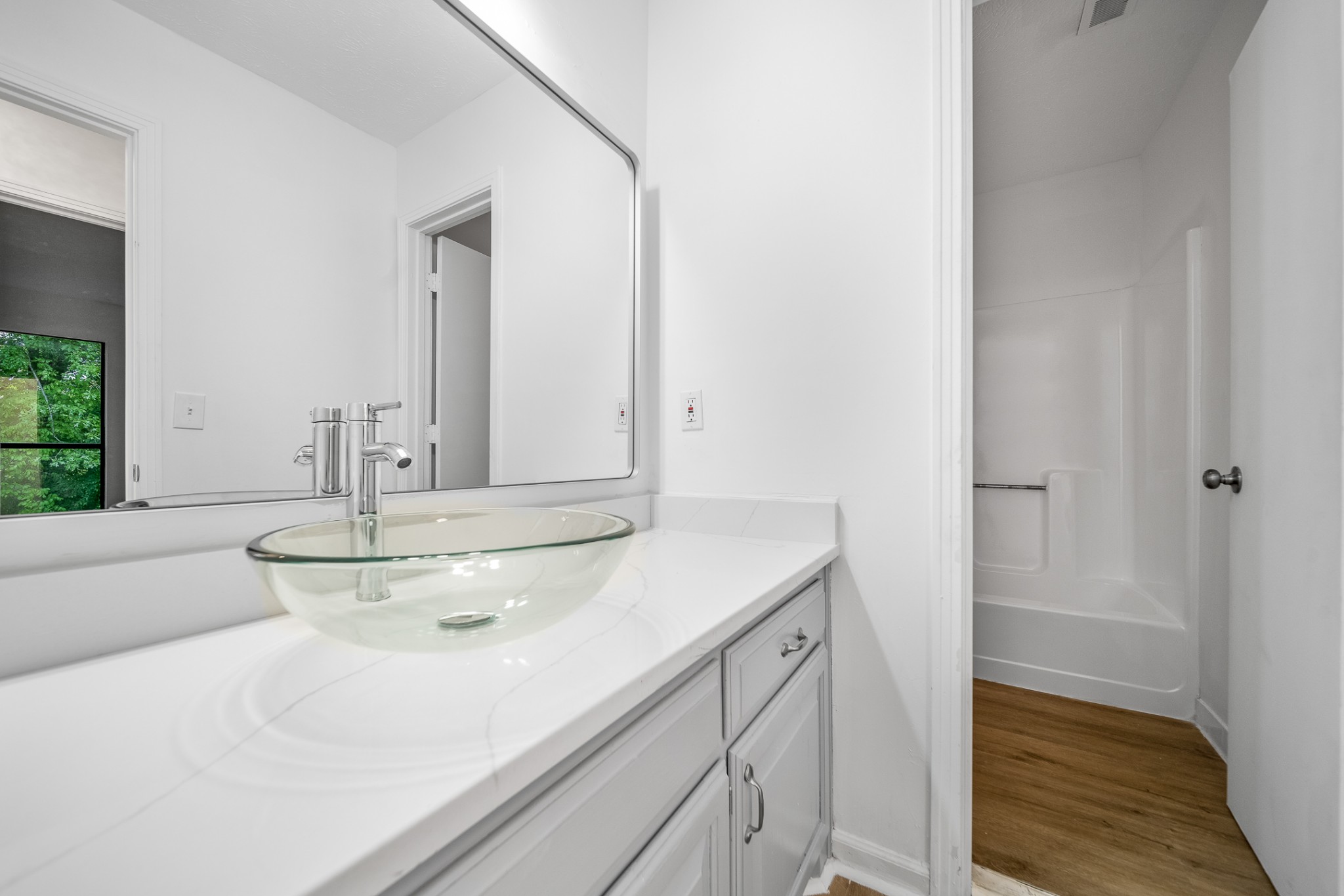 2417 Ravine Drive Nashville, TN 37217 - Photo 18 of 29 a bathroom with a sink and a mirror