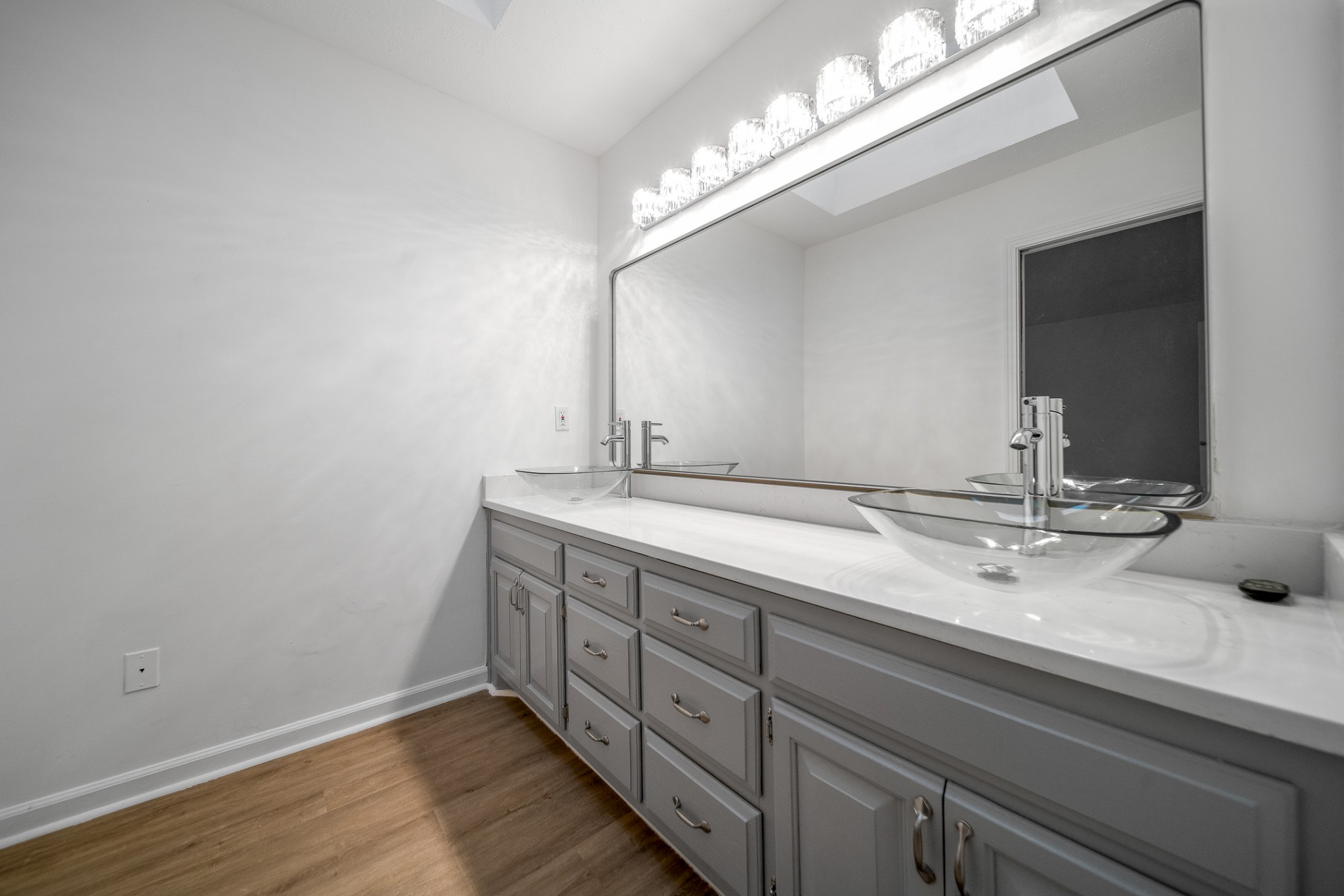 2417 Ravine Drive Nashville, TN 37217 - Photo 23 of 29 a bathroom with a double vanity sink and a mirror