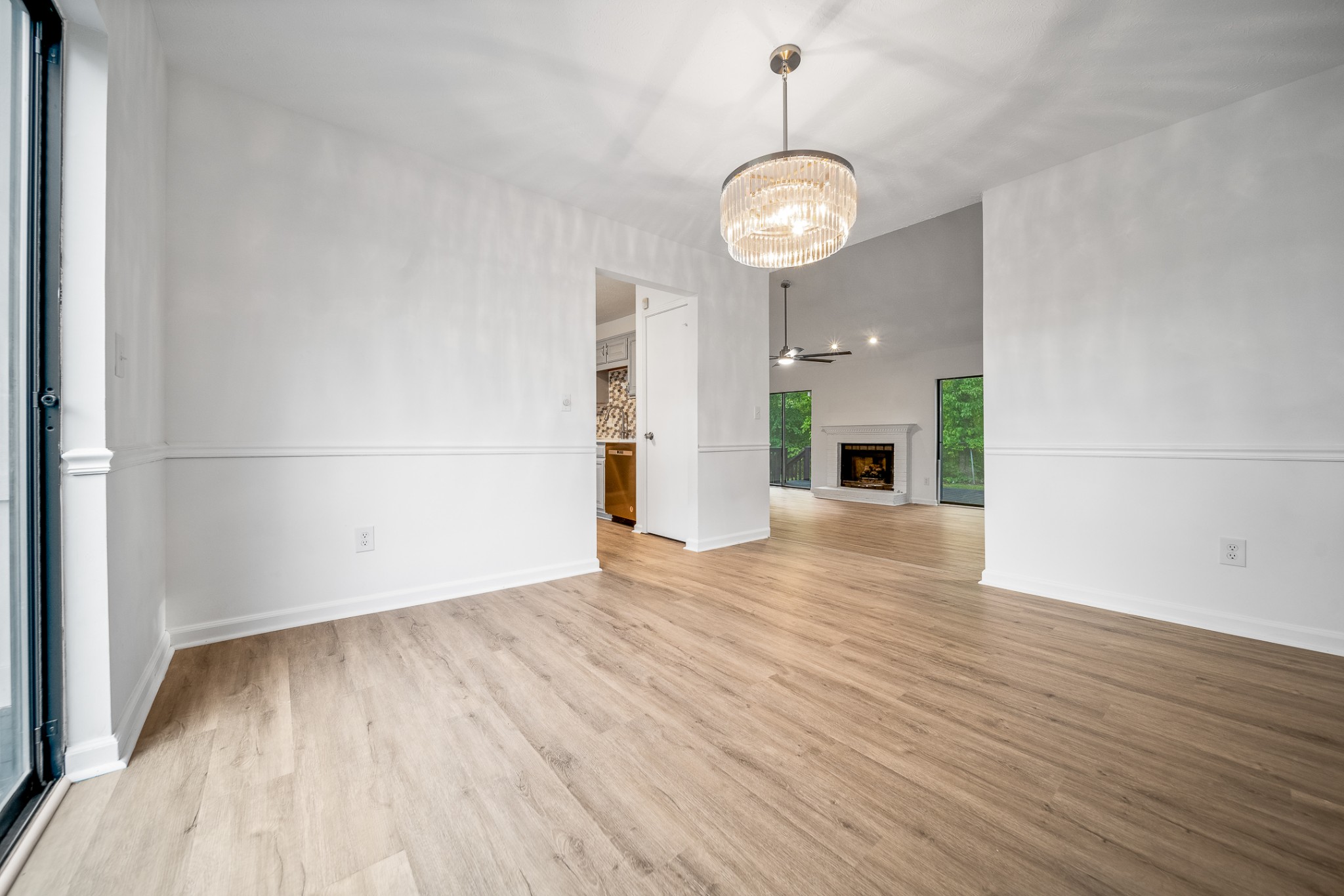 2417 Ravine Drive Nashville, TN 37217 - Photo 9 of 29 an empty room with wooden floor and windows