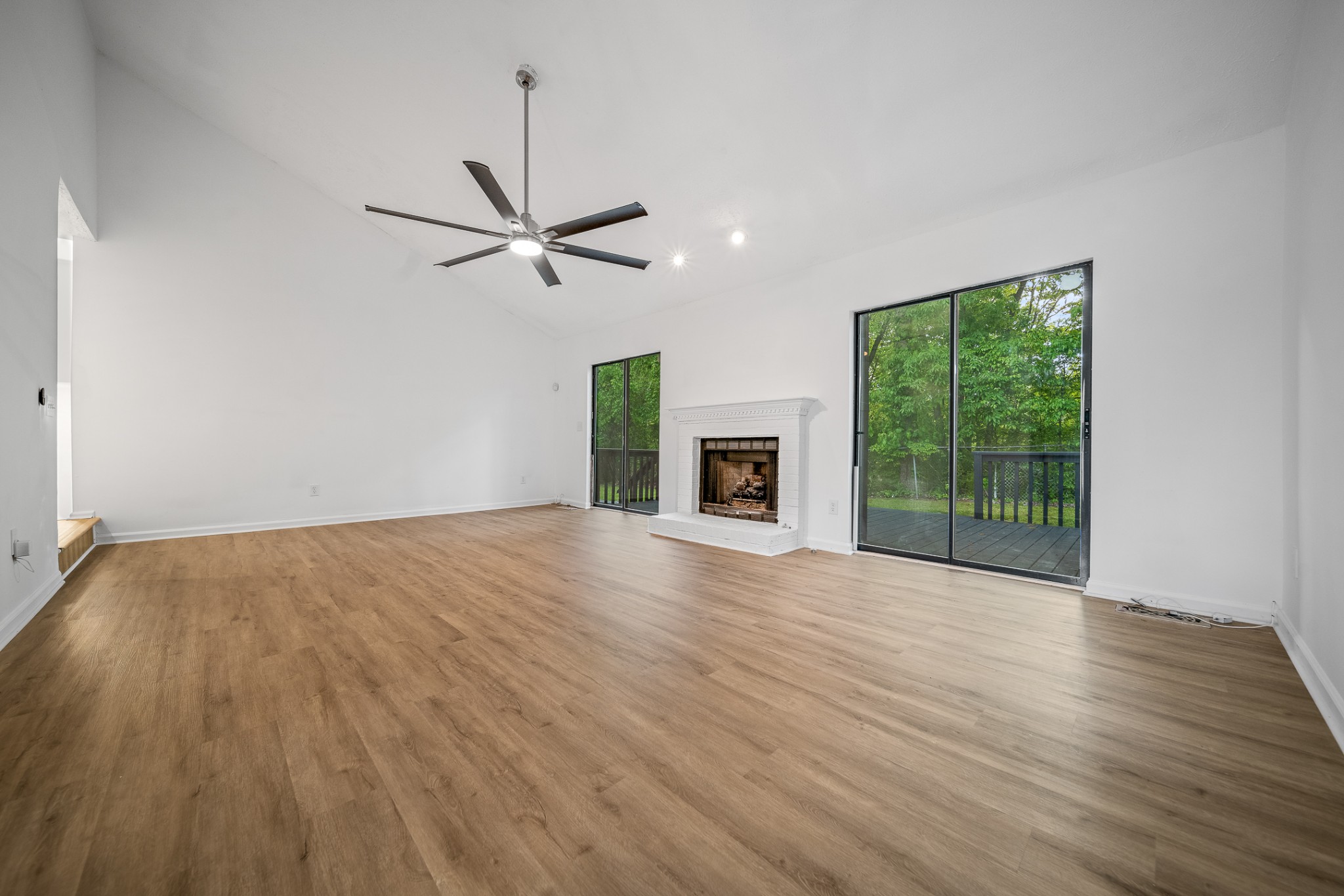 2417 Ravine Drive Nashville, TN 37217 - Photo 10 of 29 a view of empty room with wooden floor and fan