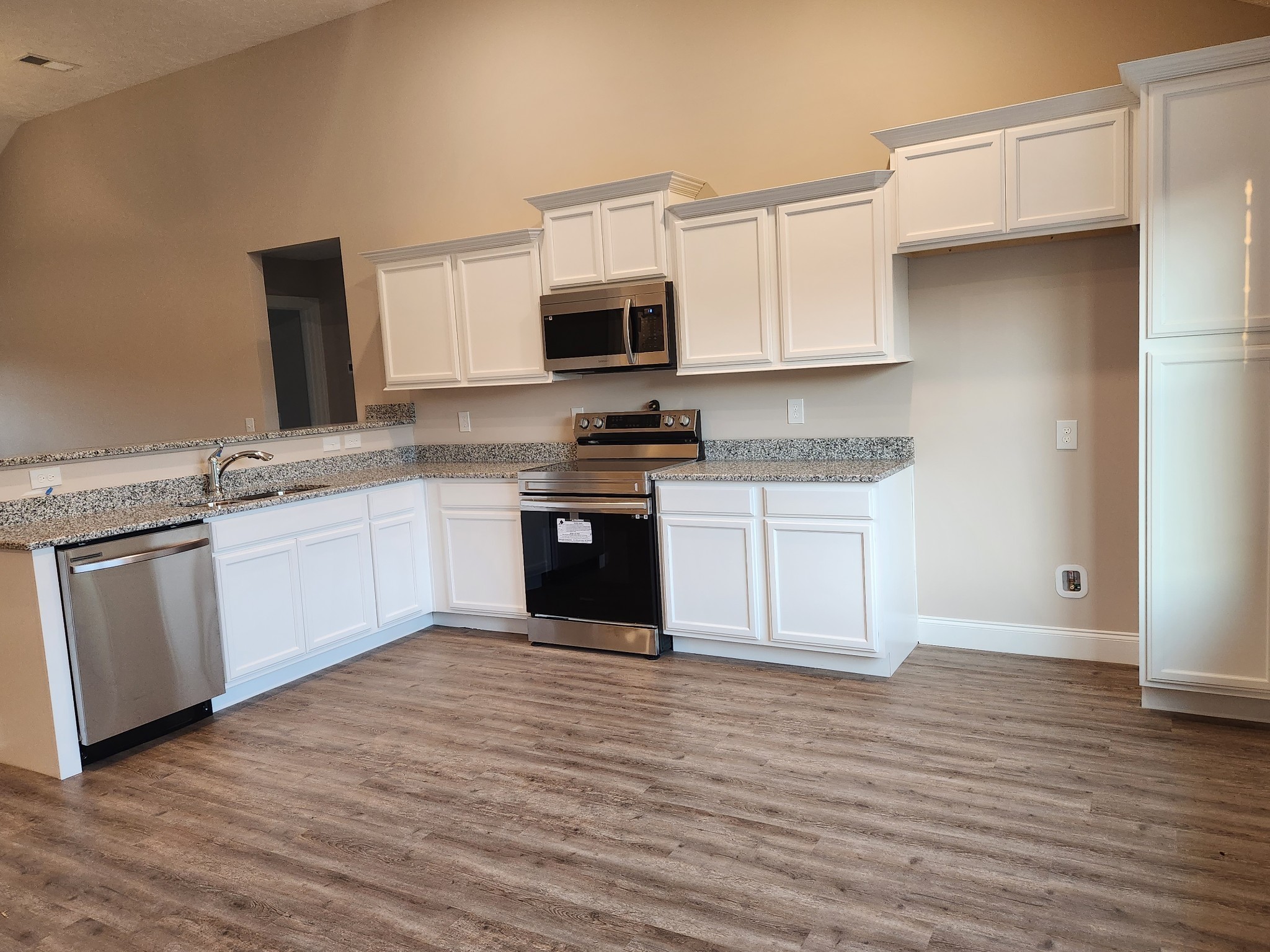 2112 Red Barn Road Christiana, TN 37037 - Photo 13 of 67 Spacious Kitchen with Waterproof Plank Flooring and Custom Cabinets with Soft Close Doors. Picture of Similar House.