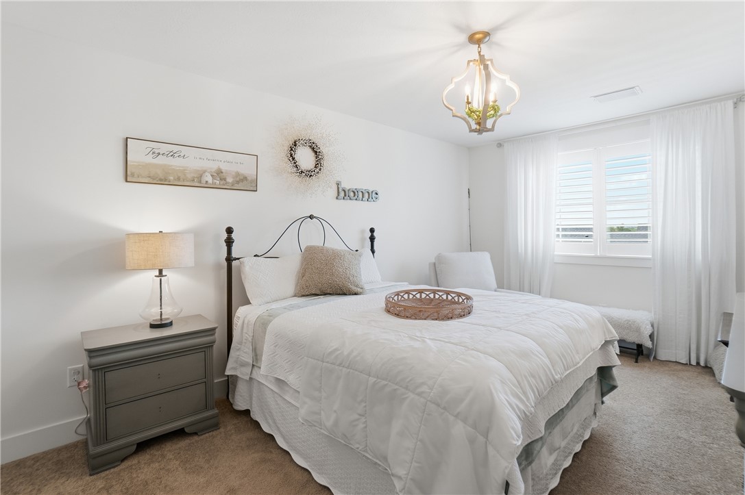 605 Cape Cod Court Beavercreek, OH 45430 - Photo 37 of 54 This restful bedroom offers a tranquil retreat with soft lighting and comfortable carpeting.