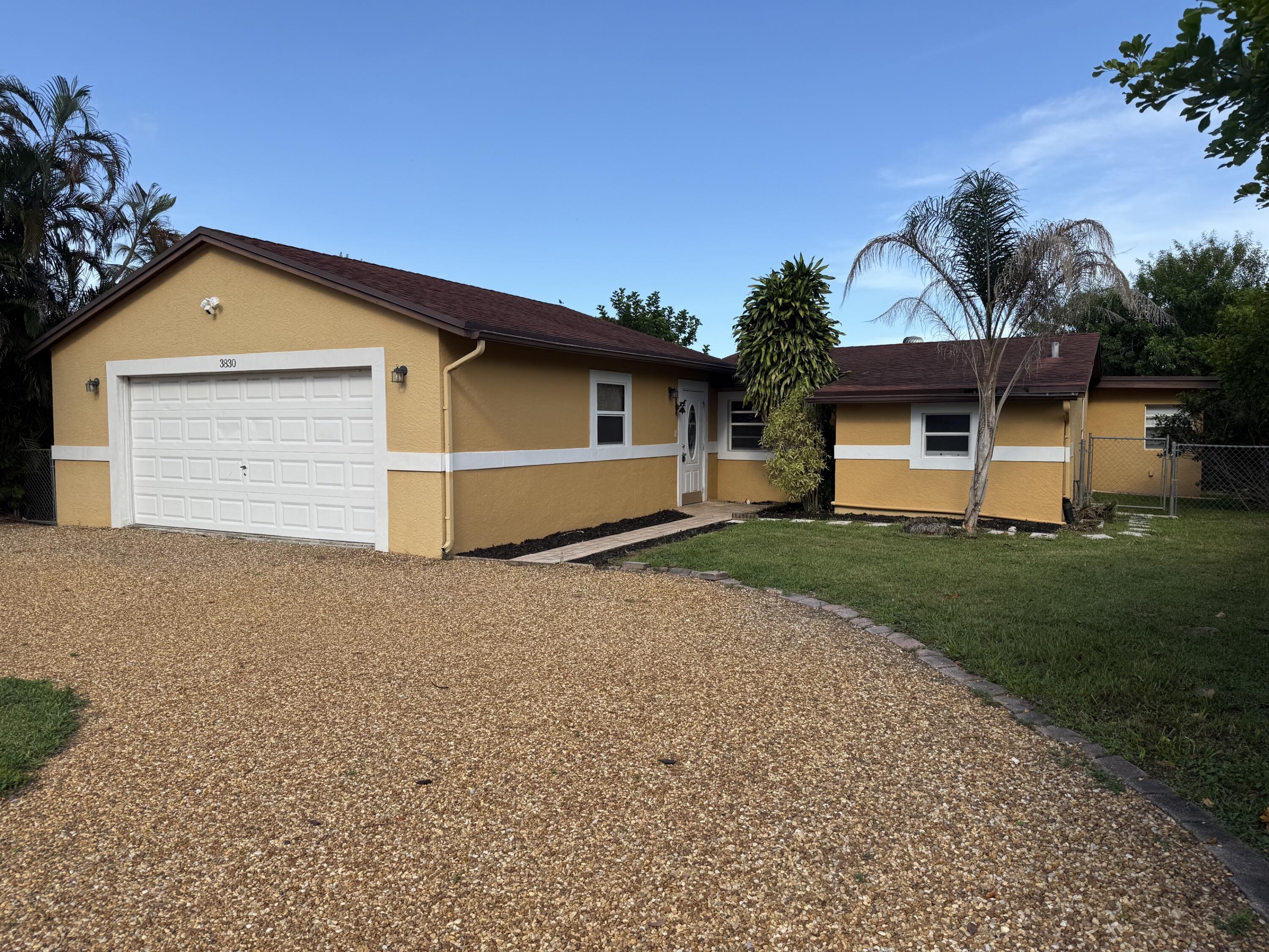 3830 Davis Road Palm Springs, FL 33461 - Photo 1 of 15 Front Elevation