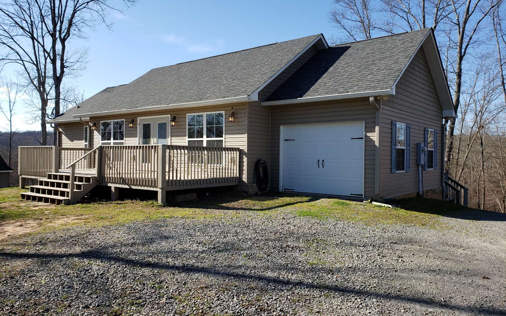 115 Shady Grove Lane Blue Ridge, GA 30513 - Photo 1 of 1 a view of a house with a yard and roof
