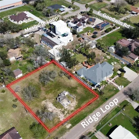an aerial view of a highlighted house