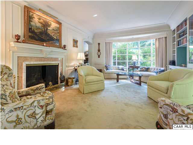 1939 Blue Ridge Road Charlottesville, VA 22903 - Photo 4 of 12 a living room with furniture and a fireplace