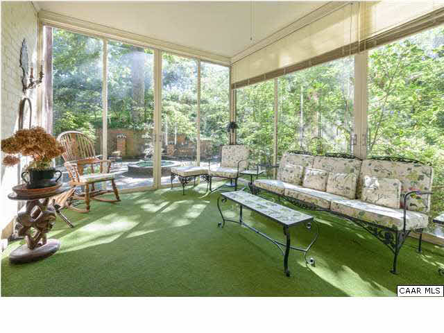 1939 Blue Ridge Road Charlottesville, VA 22903 - Photo 8 of 12 a living room filled with furniture and a garden