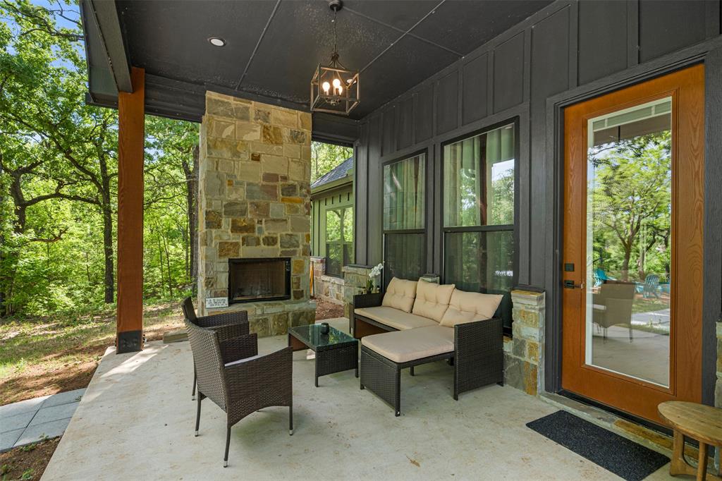 265 Shadow Oaks Streetman, TX 75859 - Photo 30 of 40 Patio with Fireplace