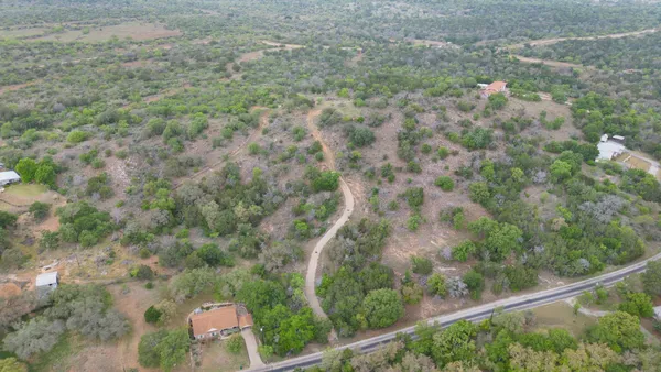a view of a forest from balcony