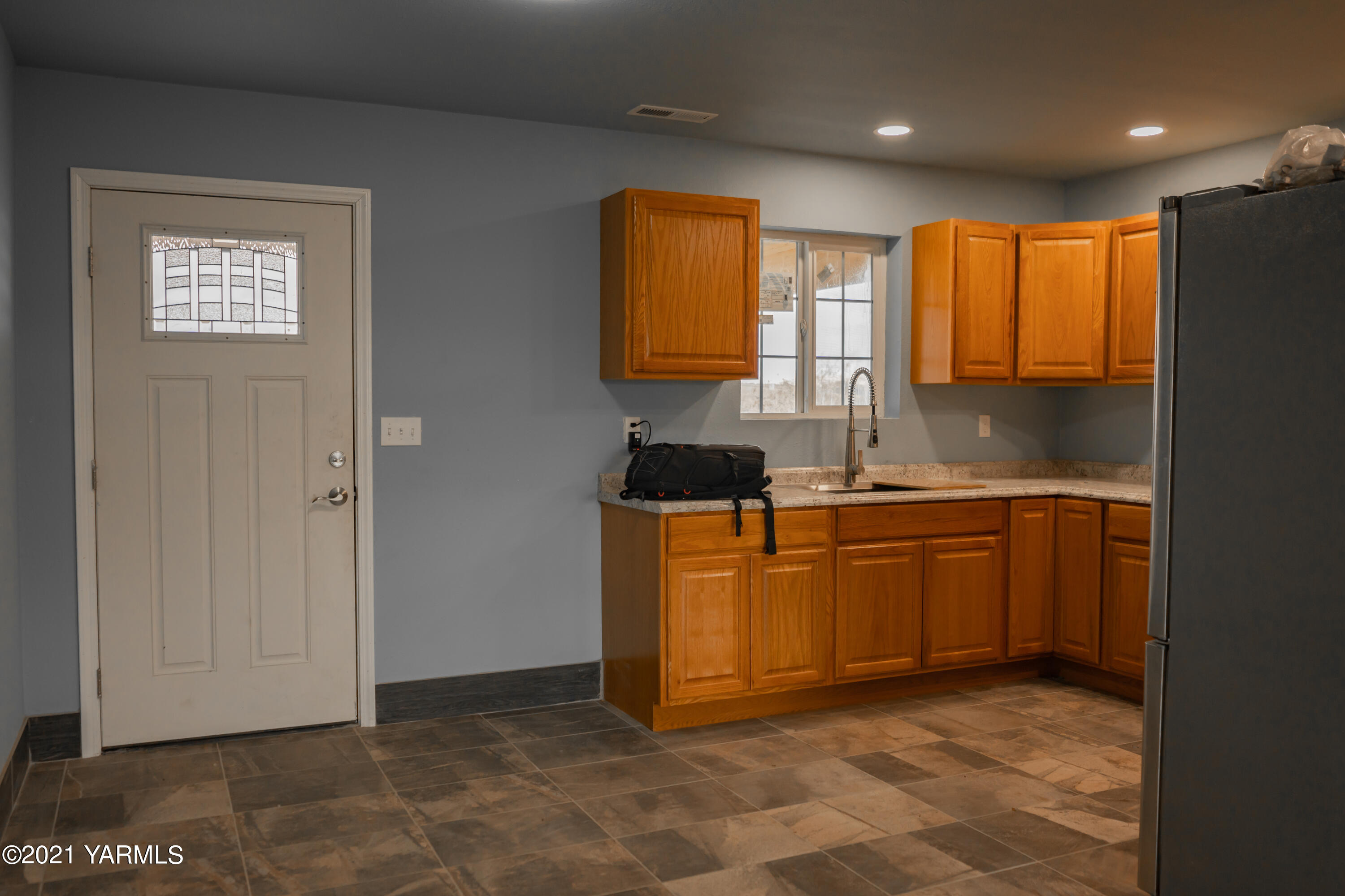 281 Starview Road Yakima, WA 98908 - Photo 10 of 26 a kitchen with stainless steel appliances granite countertop a sink a stove and a refrigerator