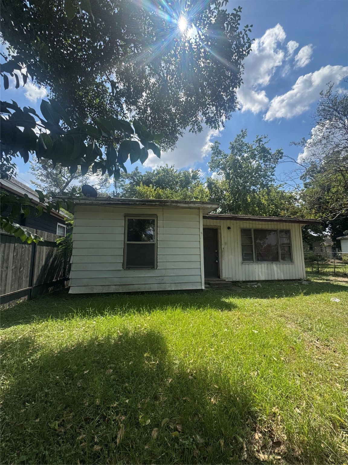 3018 Cactus Street Houston, TX 77026 - Photo 2 of 6 a backyard of a house with lots of green space