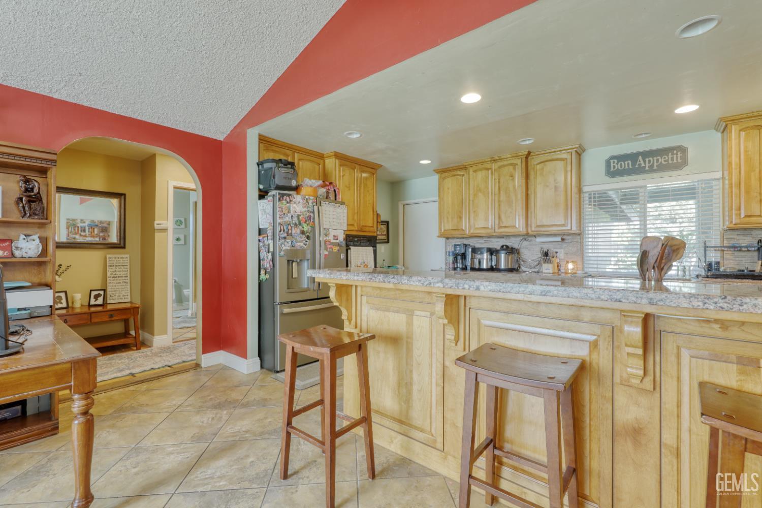 Undisclosed Address Bakersfield, CA 93308 - Photo 23 of 64 a kitchen with stainless steel appliances granite countertop a sink and cabinets