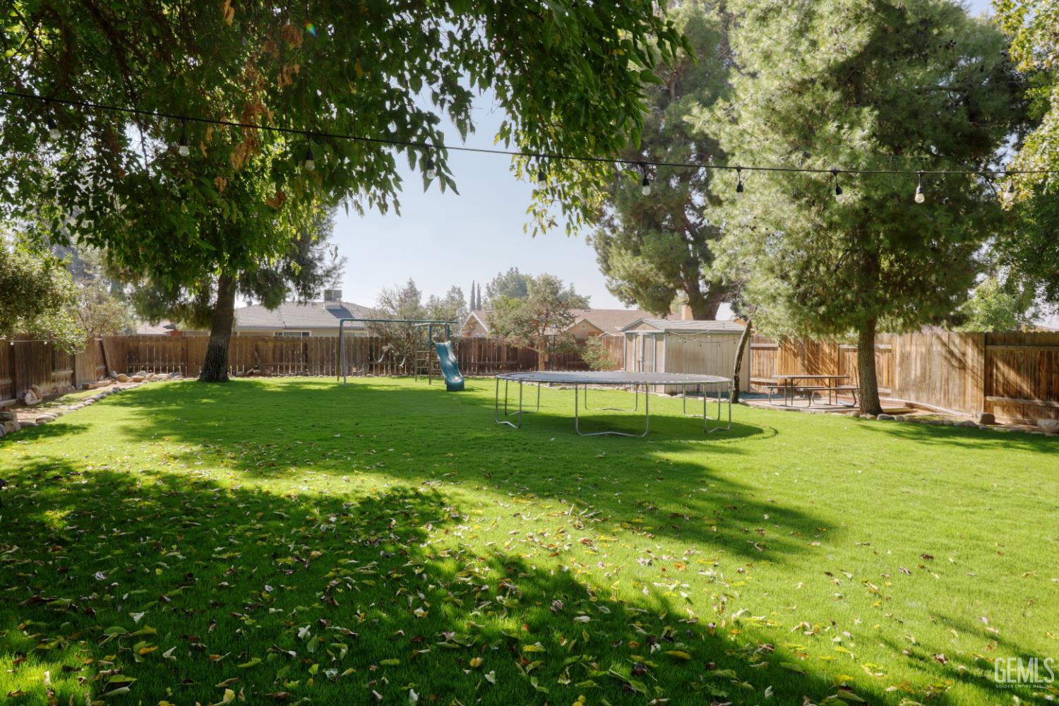 Undisclosed Address Bakersfield, CA 93308 - Photo 54 of 64 a view of a house with a big yard