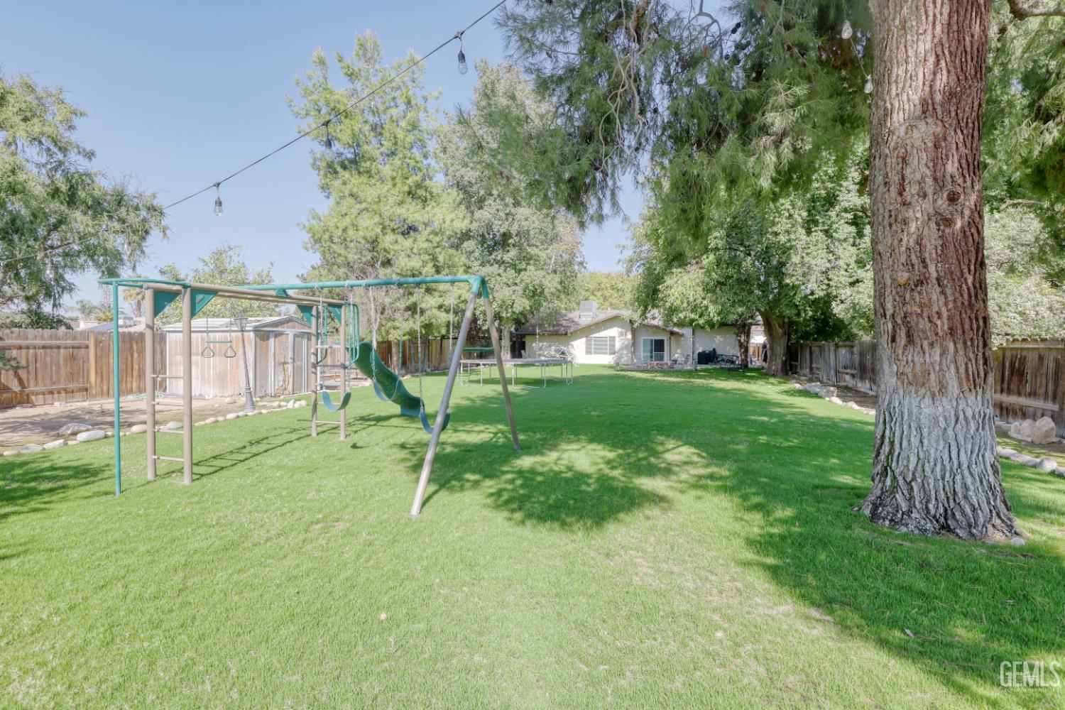 Undisclosed Address Bakersfield, CA 93308 - Photo 55 of 64 a view of a park with a tree