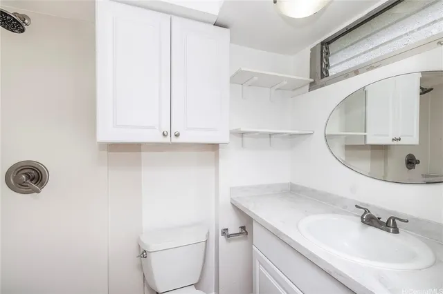 a bathroom with a sink and mirror