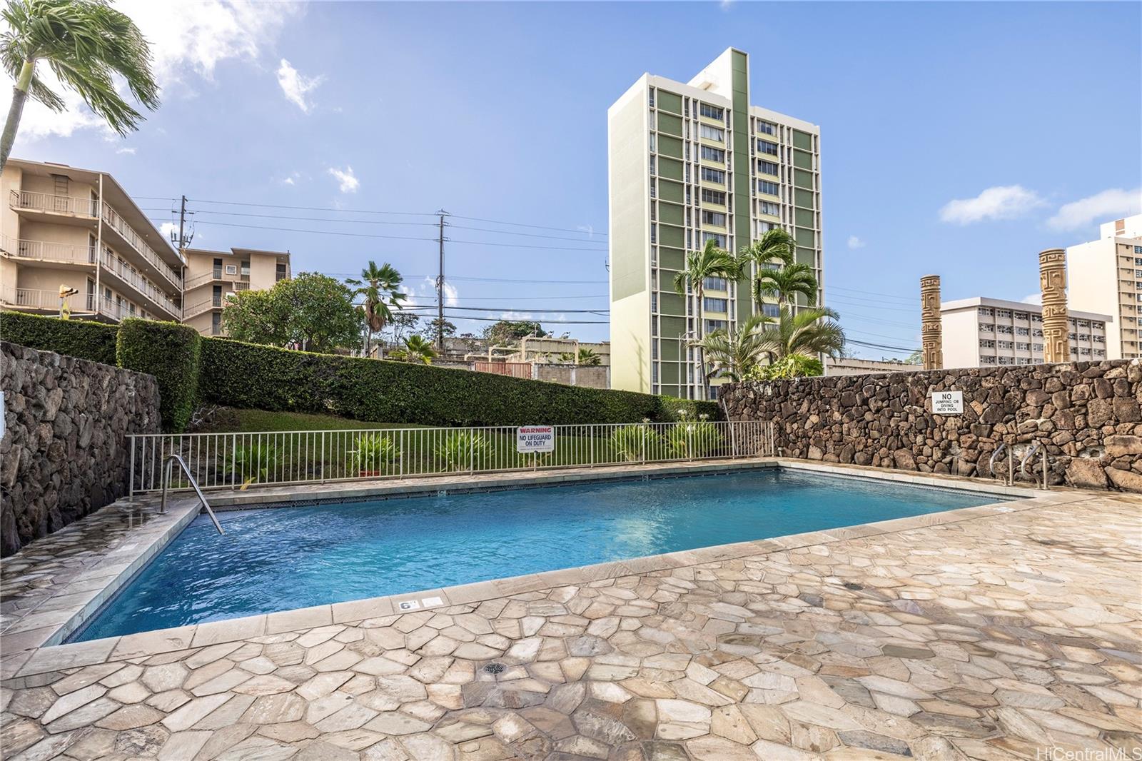 2888 Ala Ilima Street, Unit 1901 Honolulu, HI 96818 - Photo 8 of 14 a view of a city with tall buildings