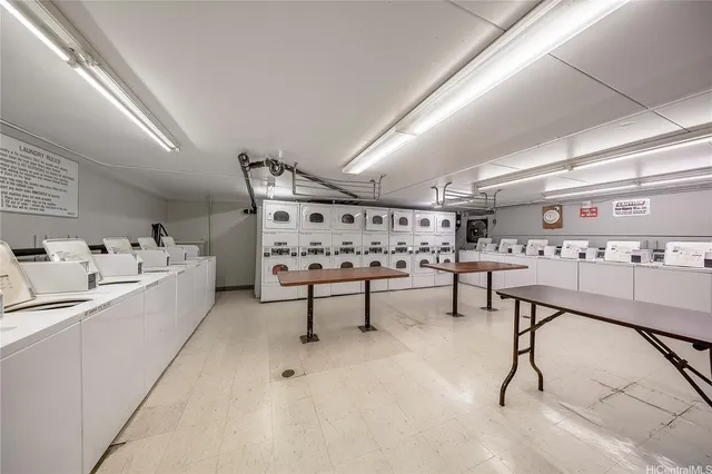 a room with furniture and white walls