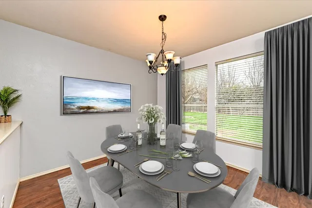 a view of an entryway with wooden floor