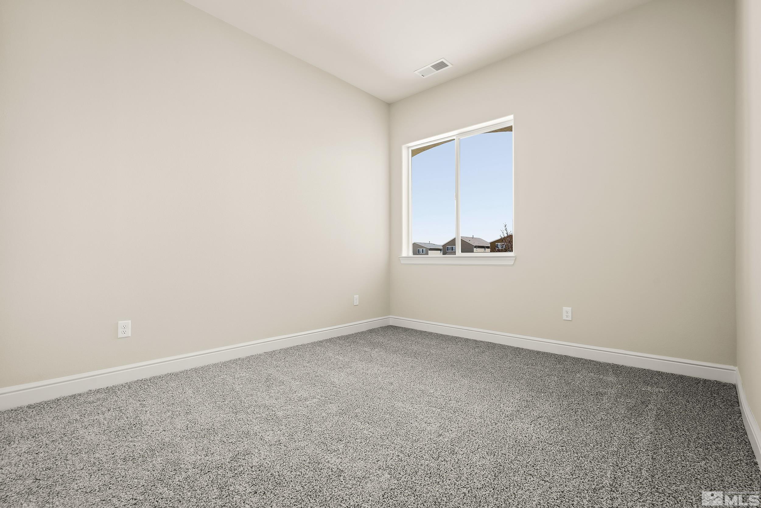 11048 Athabasca Drive Reno, NV 89506 - Photo 5 of 16 an empty room with a window