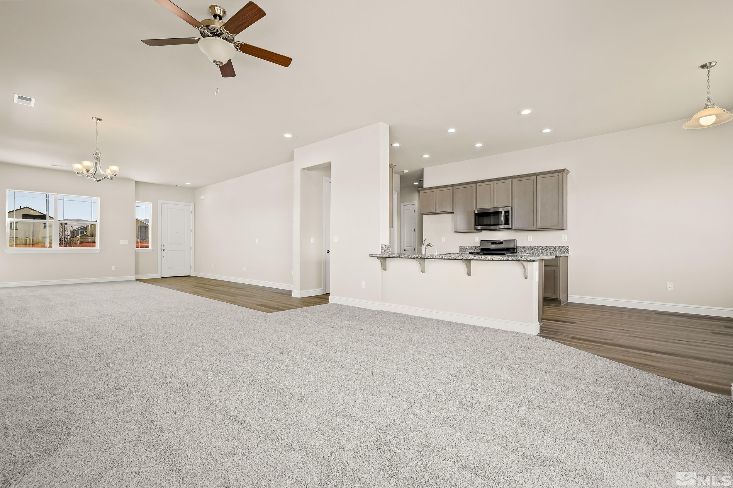 11048 Athabasca Drive Reno, NV 89506 - Photo 10 of 16 a view of a kitchen with a sink and cabinets